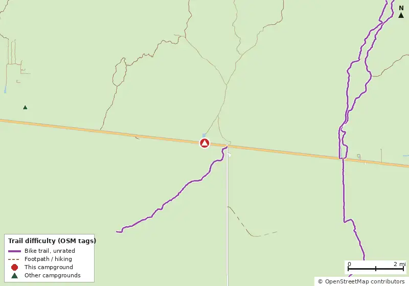 Map of roads, water and trails within about 5 miles of Monument Lake Campground, with bike trails colored by their OpenStreetMap difficulty tags
