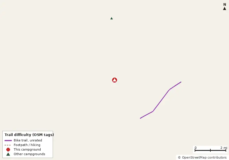Map of roads, water and trails within about 5 miles of Mullet Lake Boat Ramp, with bike trails colored by their OpenStreetMap difficulty tags