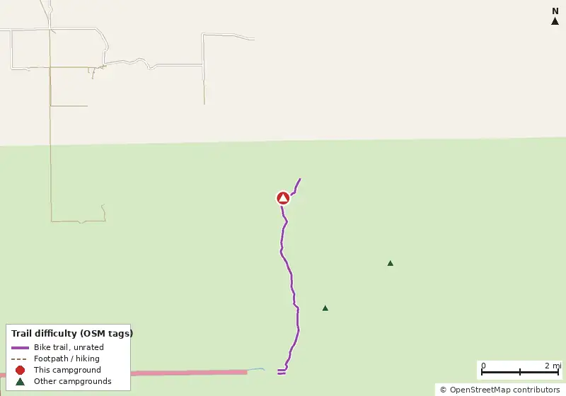 Map of roads, water and trails within about 5 miles of Nobles Camp, with bike trails colored by their OpenStreetMap difficulty tags