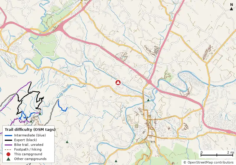 Map of roads, water and trails within about 5 miles of North Fork Resort Associates, with bike trails colored by their OpenStreetMap difficulty tags