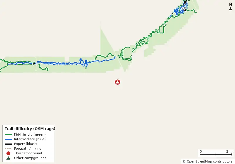 Map of roads, water and trails within about 5 miles of Ocala Sun RV Resort, with bike trails colored by their OpenStreetMap difficulty tags