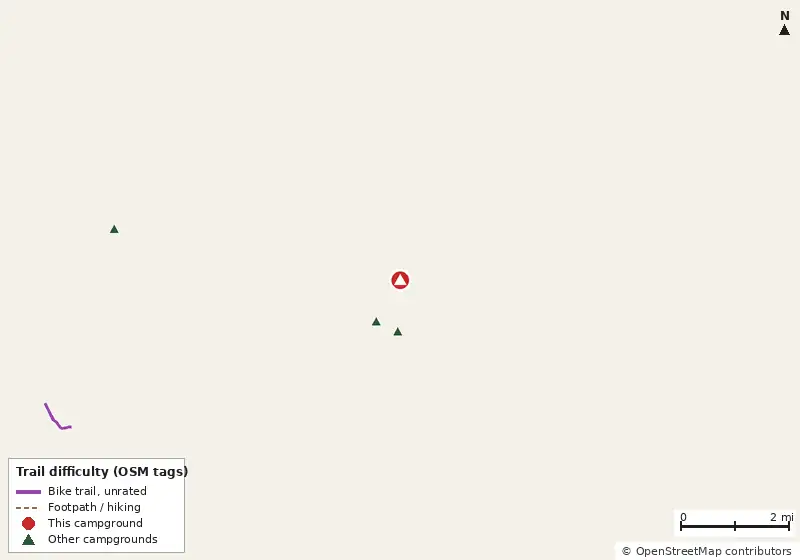 Map of roads, water and trails within about 5 miles of Outpost Camp, with bike trails colored by their OpenStreetMap difficulty tags
