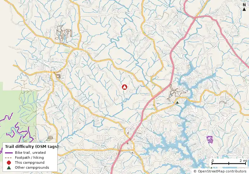 Map of roads, water and trails within about 5 miles of Paradise Valley Resort & Club, with bike trails colored by their OpenStreetMap difficulty tags