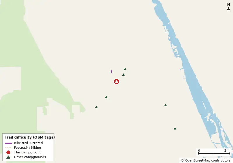 Map of roads, water and trails within about 5 miles of Park West, with bike trails colored by their OpenStreetMap difficulty tags