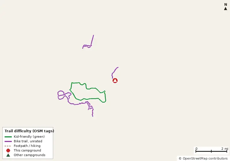 Map of roads, water and trails within about 5 miles of Paynes Prairie Preserve State Park Campground, with bike trails colored by their OpenStreetMap difficulty tags
