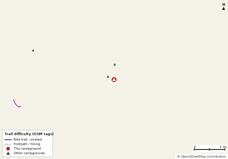 Map of roads, water and trails within about 5 miles of Pine Meadow, with bike trails colored by their OpenStreetMap difficulty tags