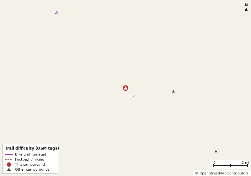 Map of roads, water and trails within about 5 miles of Raccoon River Campground, with bike trails colored by their OpenStreetMap difficulty tags