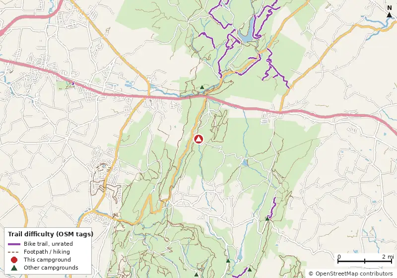 Map of roads, water and trails within about 5 miles of Raccoon Run - Michaux Campsite #15, with bike trails colored by their OpenStreetMap difficulty tags