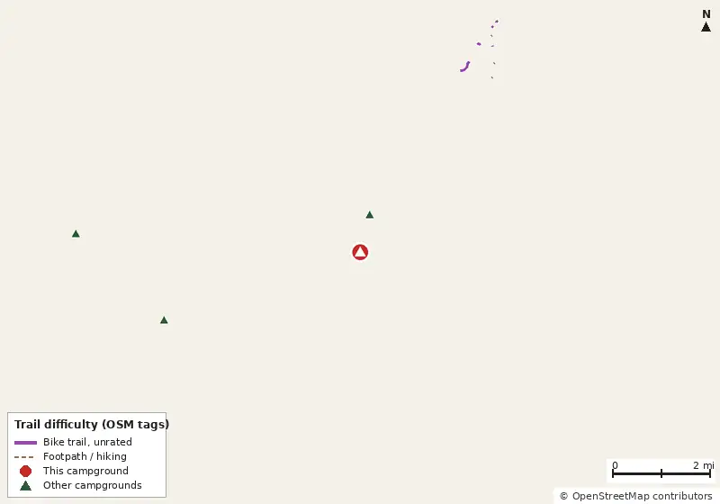 Map of roads, water and trails within about 5 miles of Rainbow Chase RV Resort, with bike trails colored by their OpenStreetMap difficulty tags