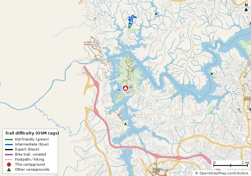 Map of roads, water and trails within about 5 miles of Red Top Mountain State Park Campground, with bike trails colored by their OpenStreetMap difficulty tags