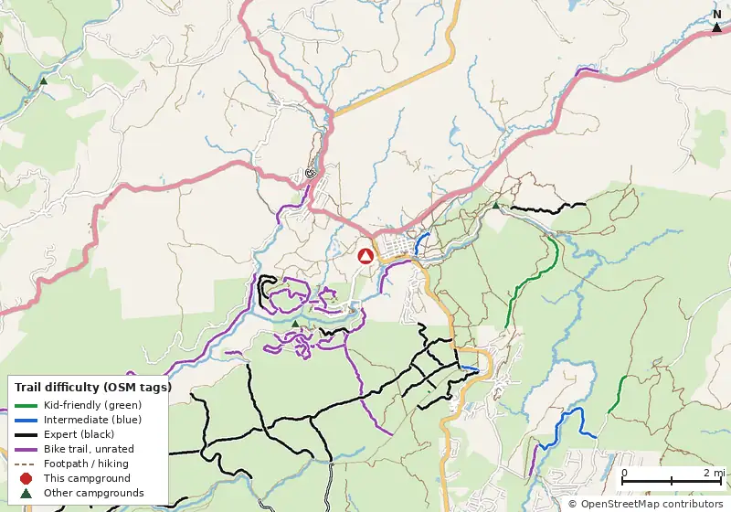 Map of roads, water and trails within about 5 miles of Restrite Campground, with bike trails colored by their OpenStreetMap difficulty tags