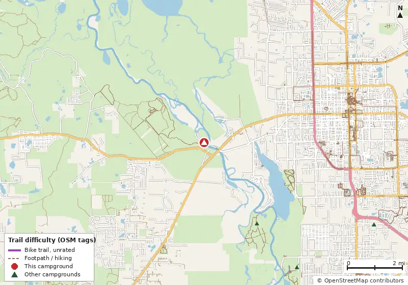 Map of roads, water and trails within about 5 miles of River Forest Group Site, with bike trails colored by their OpenStreetMap difficulty tags