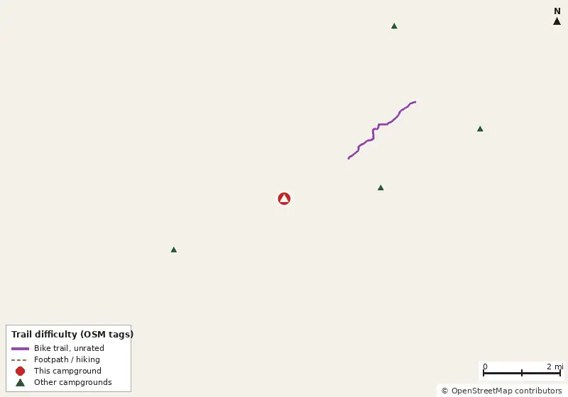 Map of roads, water and trails within about 5 miles of River Rise Preserve State Park Campground, with bike trails colored by their OpenStreetMap difficulty tags