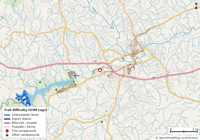 Map of roads, water and trails within about 5 miles of Rivers Edge Park, with bike trails colored by their OpenStreetMap difficulty tags