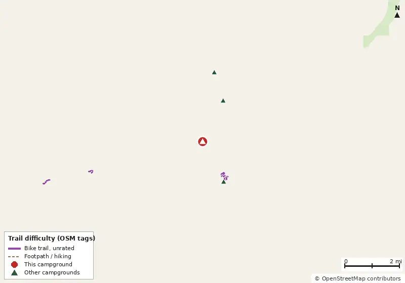 Map of roads, water and trails within about 5 miles of San Carlos RV Park and Island Resort, with bike trails colored by their OpenStreetMap difficulty tags