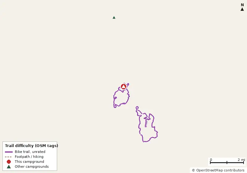 Map of roads, water and trails within about 5 miles of Sand Pond Recreation Area, with bike trails colored by their OpenStreetMap difficulty tags