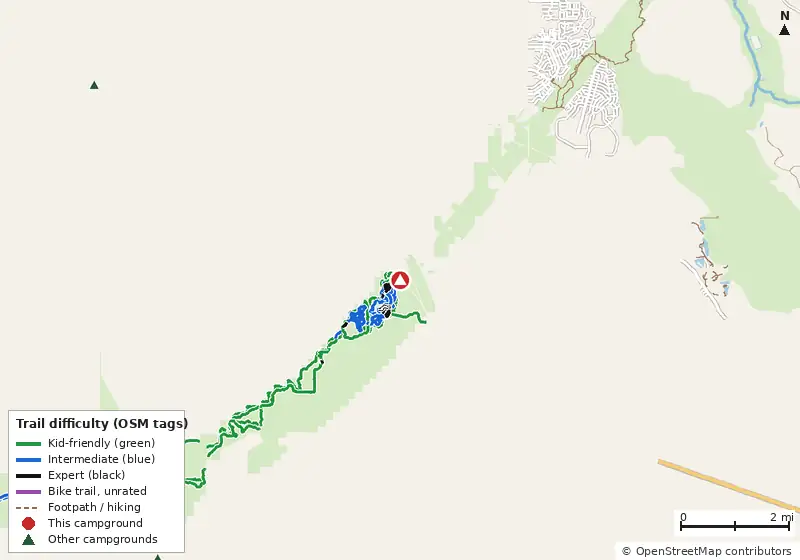 Map of roads, water and trails within about 5 miles of Santos Campground, with bike trails colored by their OpenStreetMap difficulty tags