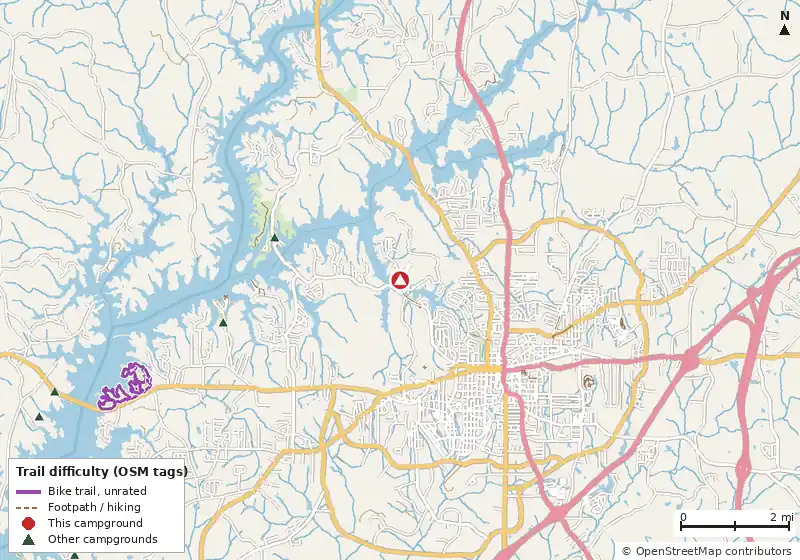 Map of roads, water and trails within about 5 miles of Sunny Point Park, with bike trails colored by their OpenStreetMap difficulty tags