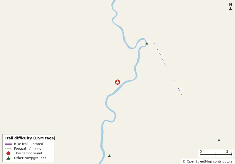 Map of roads, water and trails within about 5 miles of Suwannee RIver Hideaway Campground, with bike trails colored by their OpenStreetMap difficulty tags