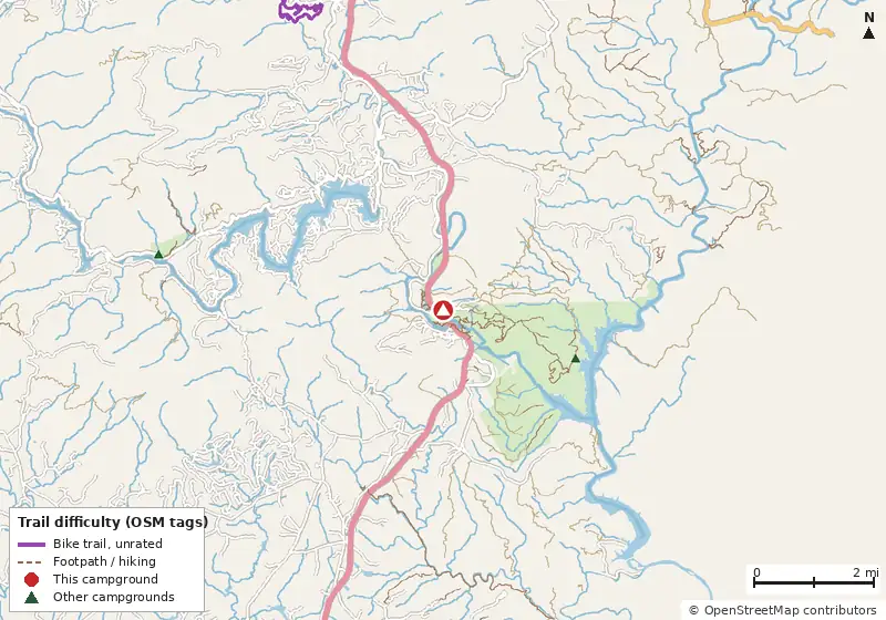 Map of roads, water and trails within about 5 miles of Tallulah Gorge State Park Campground, with bike trails colored by their OpenStreetMap difficulty tags