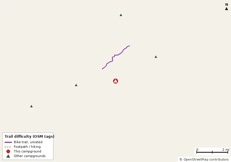 Map of roads, water and trails within about 5 miles of Tent Camping, with bike trails colored by their OpenStreetMap difficulty tags