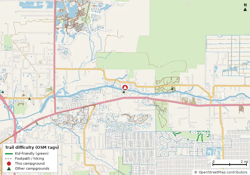 Map of roads, water and trails within about 5 miles of W.p. Franklin n, with bike trails colored by their OpenStreetMap difficulty tags