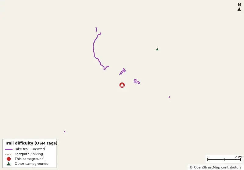Map of roads, water and trails within about 5 miles of Wekiwa Springs State Park Campground, with bike trails colored by their OpenStreetMap difficulty tags