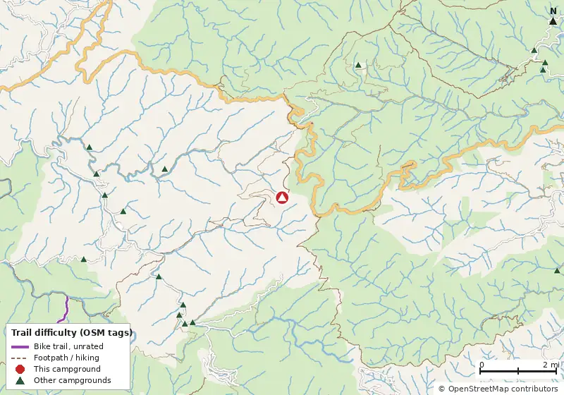 Map of roads, water and trails within about 5 miles of Whigg Meadow, with bike trails colored by their OpenStreetMap difficulty tags