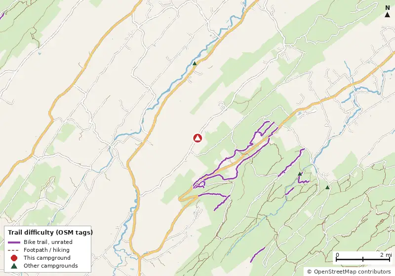 Map of roads, water and trails within about 5 miles of Wildwood RV Resort, with bike trails colored by their OpenStreetMap difficulty tags
