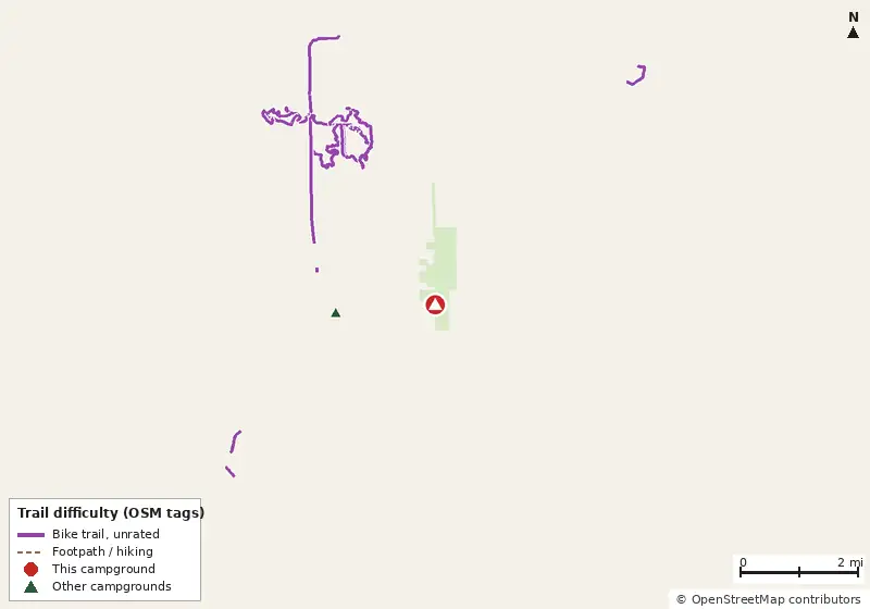 Map of roads, water and trails within about 5 miles of Wiley Dykes Camp, with bike trails colored by their OpenStreetMap difficulty tags