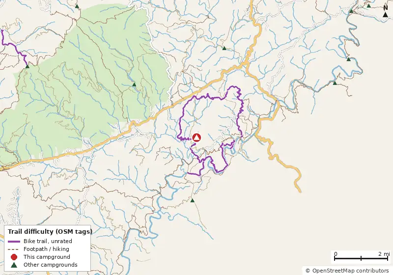 Map of roads, water and trails within about 5 miles of Willis Knob Horse Camp, with bike trails colored by their OpenStreetMap difficulty tags