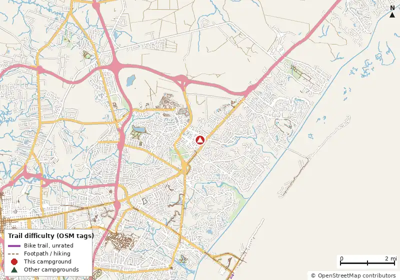 Map of roads, water and trails within about 5 miles of Wilmington KOA Holiday, with bike trails colored by their OpenStreetMap difficulty tags