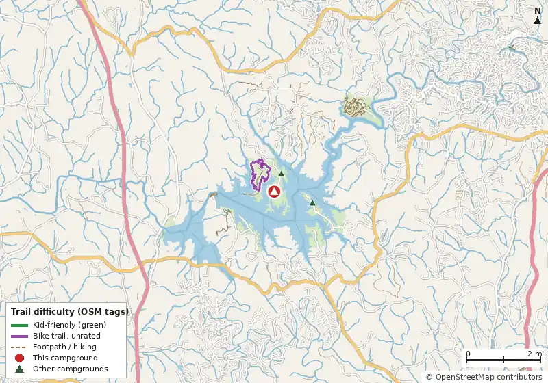 Map of roads, water and trails within about 5 miles of Woodring Campground, with bike trails colored by their OpenStreetMap difficulty tags
